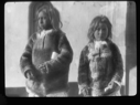 Image of Two Inuit boys aboard
